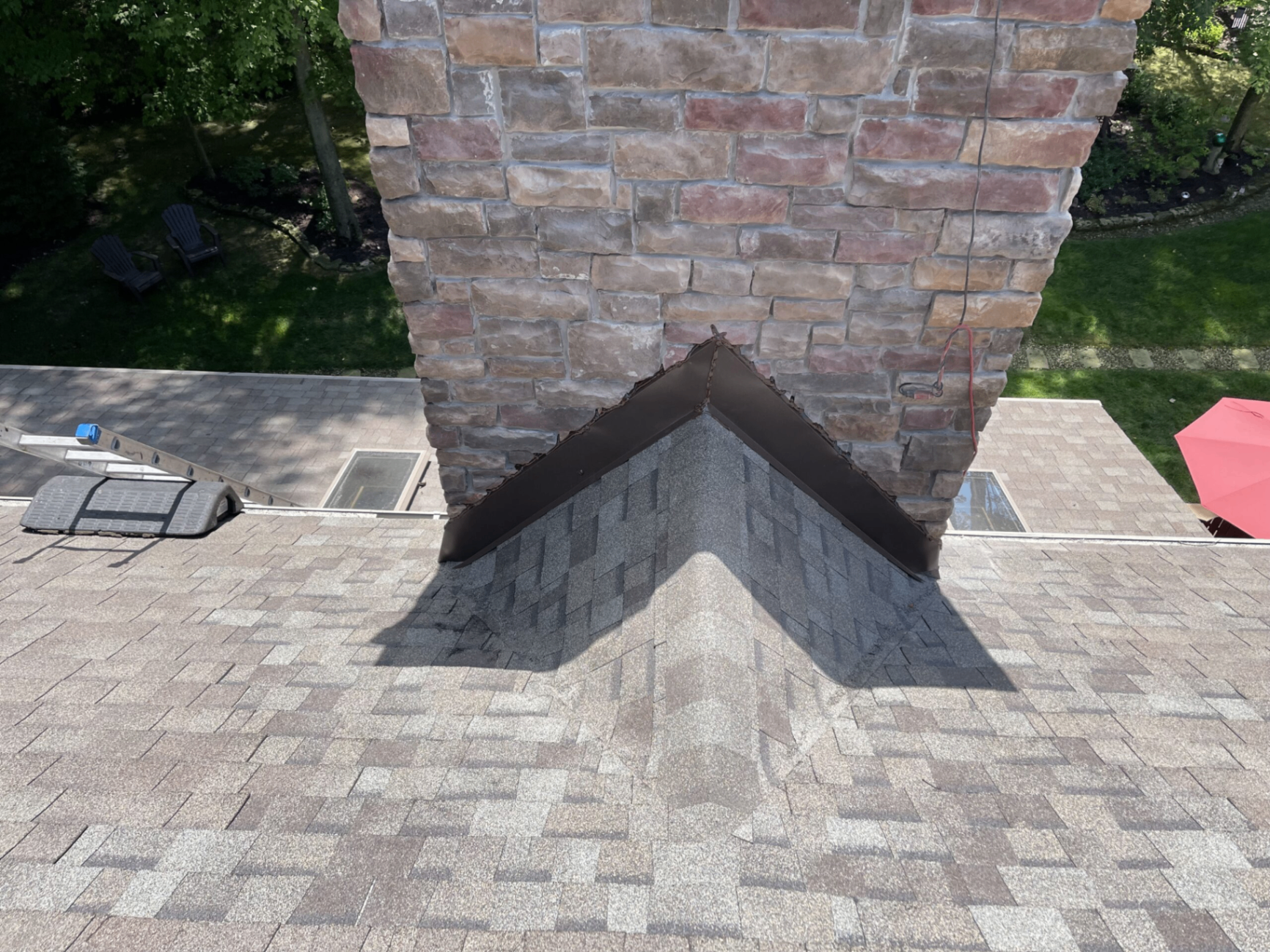 Chimney flashing and shingle detail